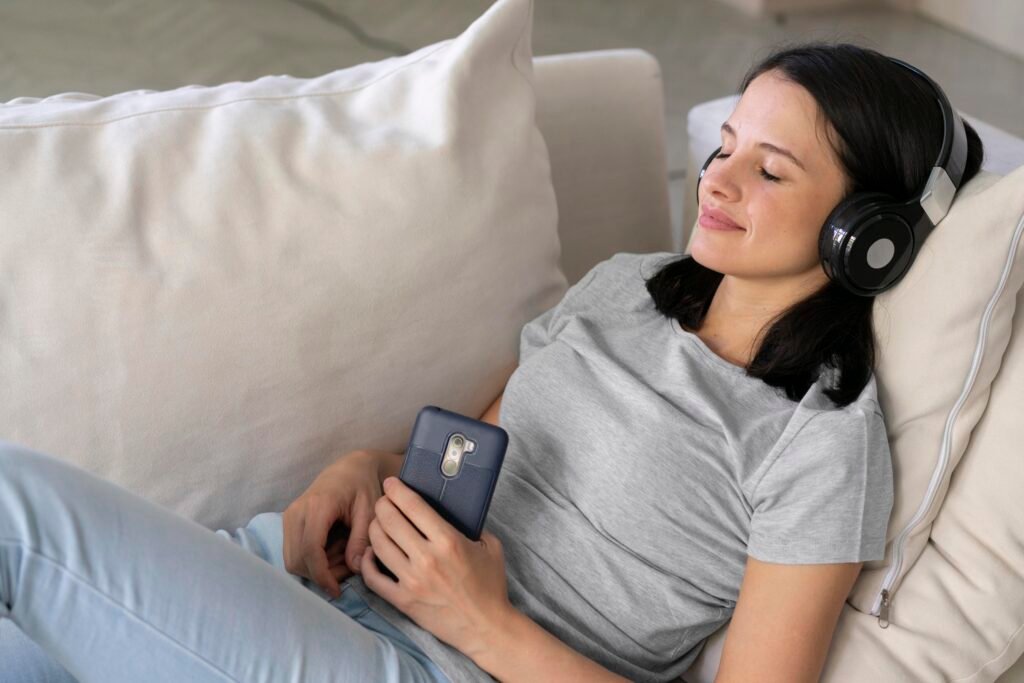 Woman relaxing and improving focus with a 12-minute sound therapy